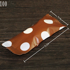 Túi đựng kẹo nougat nâu chấm trắng (100c)