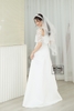 Váy cưới phi nhật trắng tay con lông vũ DC541